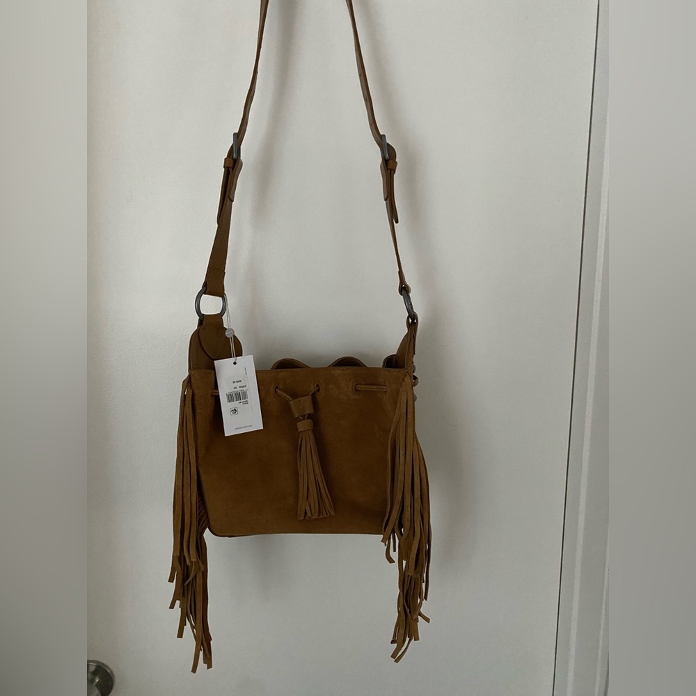 NWT AREZZO Austin Med Fringe Bucket Bag. Cognac suede 11x8x5. $269